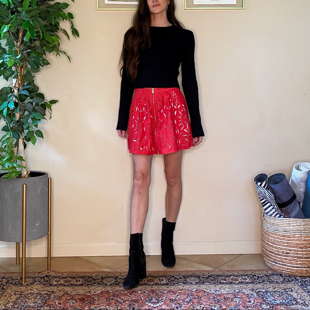 Red faux leather cut out mini skirt